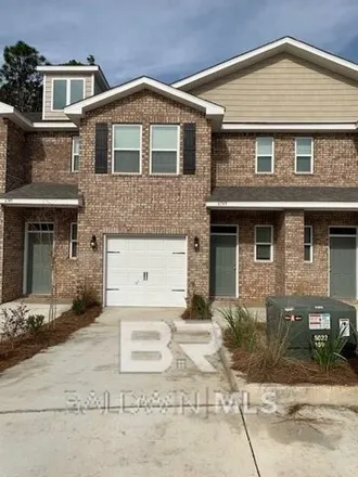 Rent this 3 bed townhouse on 6793 Spaniel Drive in Spanish Fort, AL 36527