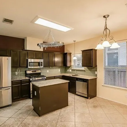 Rent this 3 bed apartment on 10528 South Canoa Hills Trail in Austin, TX 78717