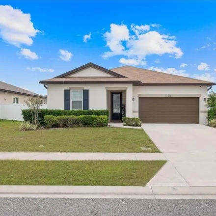 Buy this 3 bed house on Gentle Breeze Drive in Saint Cloud, FL 34771