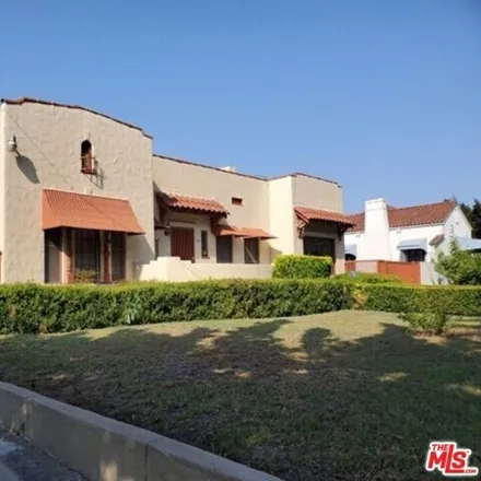 Buy this 4 bed house on 3433 Country Club Drive in Los Angeles, CA 90019