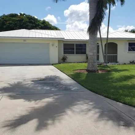 Buy this 3 bed house on 405 Luzon Ave in Naples, Florida
