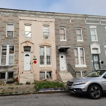 Buy this 2 bed townhouse on 1924 North Payson Street in Baltimore, MD 21217