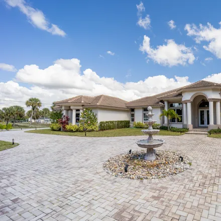 Buy this 5 bed house on Okeeheelee Park in Palm Beach County, FL