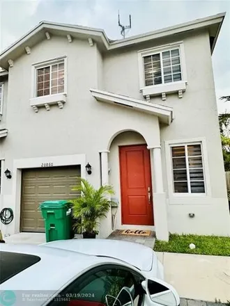 Buy this 4 bed townhouse on Northwest 9th Path in Andover, Miami Gardens