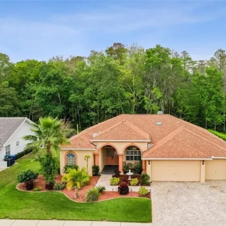 Buy this 4 bed house on 1650 Kinsmere Drive in Trinity, FL 34655