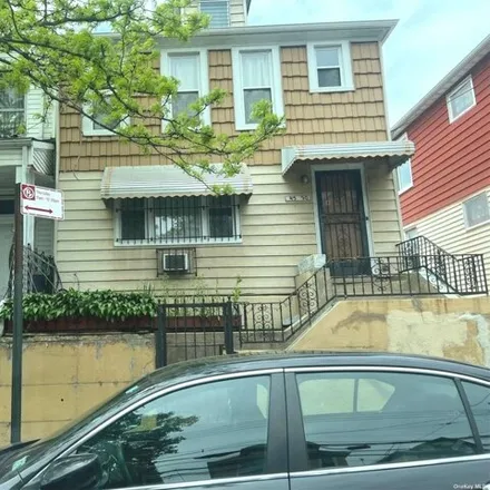 Buy this 3 bed house on 43-22 72nd Street in New York, NY 11377