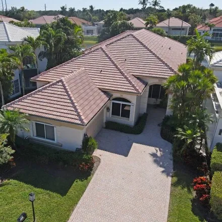 Buy this 4 bed house on 7072 Islegrove Place in Palm Beach County, FL 33433
