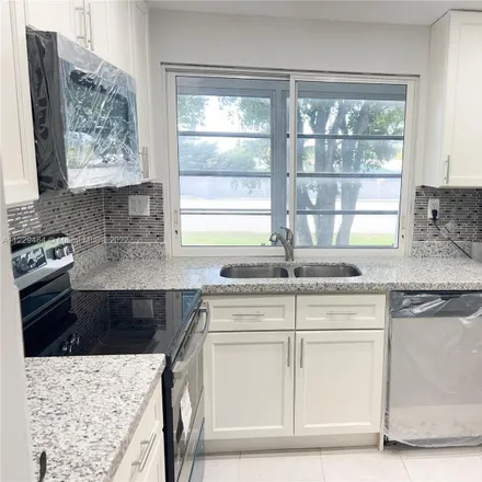 Buy this 2 bed condo on 9081 Lime Bay Boulevard in Tamarac, FL 33321