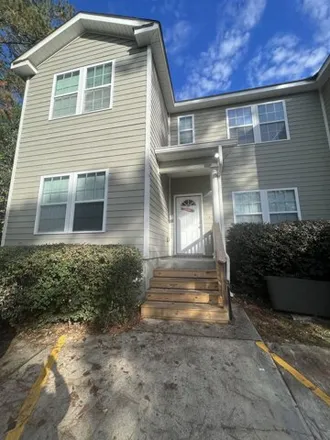 Rent this 4 bed condo on 1838 Ivy Lane in Tallahassee, FL 32304