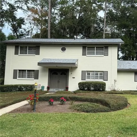 Buy this 4 bed house on 2621 Northwest 21st Avenue in Gainesville, FL 32605