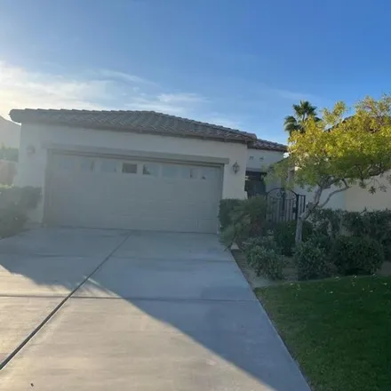 Rent this 3 bed house on 61125 Living Stone Drive in La Quinta, CA 92247