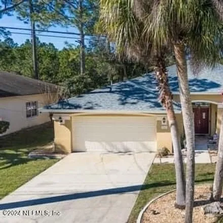 Buy this 2 bed house on 161 London Dr in Palm Coast, Florida