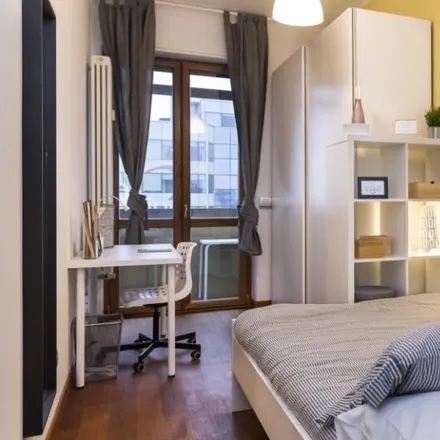 Rent this 4 bed room on Via Polesine 12 in 20139 Milan MI, Italy