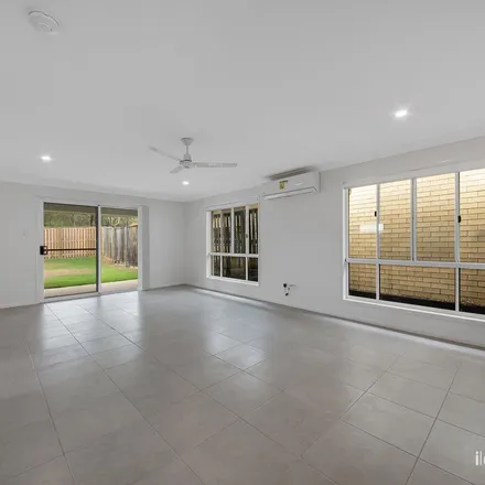 Rent this 4 bed apartment on Bulimba Street in Tannum Sands QLD, Australia