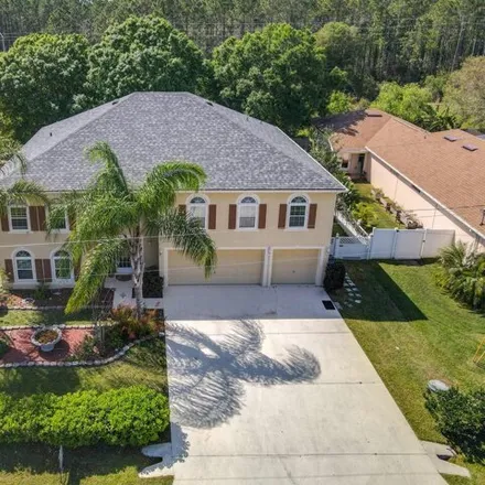 Buy this 6 bed house on 33 Buffalo Grove Dr in Palm Coast, Florida