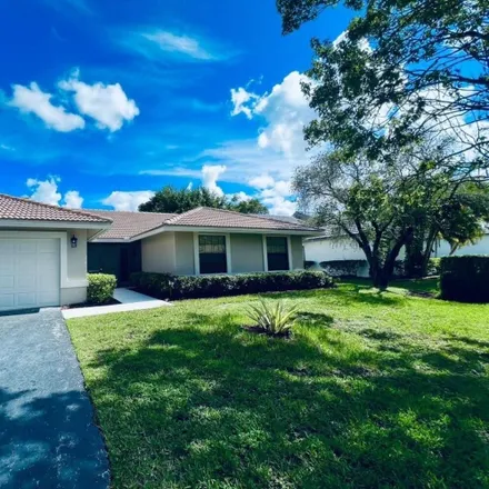 Buy this 4 bed house on 233 Northwest 119th Drive in Coral Springs, FL 33071