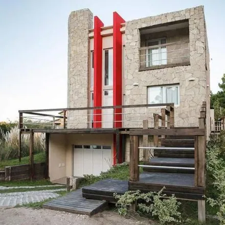 Buy this 4 bed house on Florencio Sanchez in Partido de Villa Gesell, 7165 Mar de las Pampas