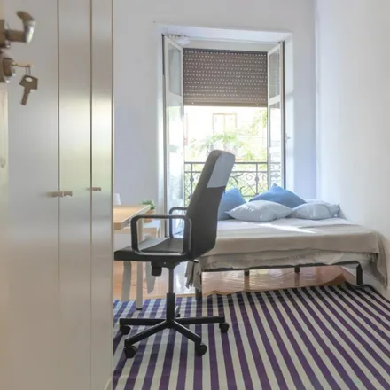 Rent this 9 bed room on Madrid in Madrid Ramos Sierra, Calle de Ferraz