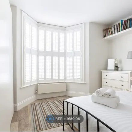 Rent this 4 bed townhouse on 10 Tadmor Street in London, W12 8AH