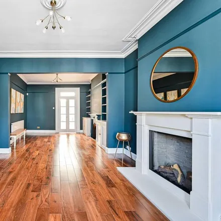 Rent this 4 bed house on 5 Parkwood Road in London, SW19 7AQ