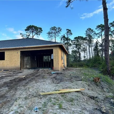 Buy this 3 bed house on 1037 Manikin Avenue South in Lehigh Acres, FL 33974