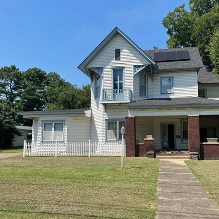 Buy this 4 bed house on 402 West Church Street in Morrilton, AR 72110