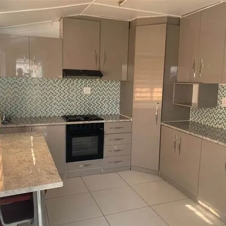 Rent this 4 bed apartment on Port Road in Chrisville, Johannesburg