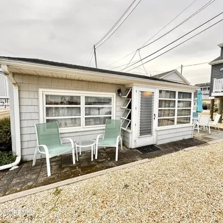 Rent this 2 bed house on 106 W Tarpon Way in Lavallette, New Jersey