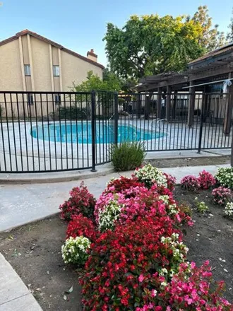 Buy this 1 bed condo on 1588 West Ashlan Avenue in Fresno, CA 93705