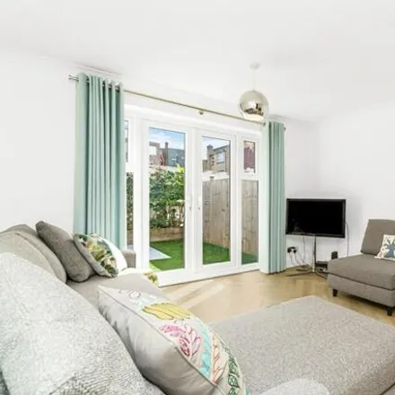 Rent this 2 bed townhouse on Eton Close in London, SW18 4UD