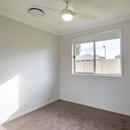 Rent this 3 bed apartment on Ellie Avenue in Raworth NSW 2321, Australia