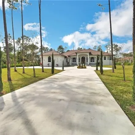 Buy this 4 bed house on 409 25th Street Northwest in Collier County, FL 34120