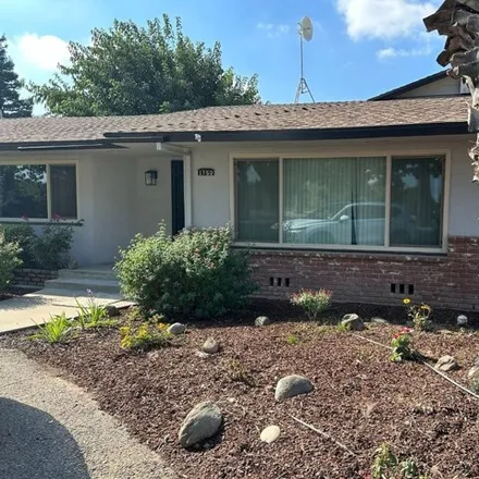 Buy this 3 bed house on 1878 South Chateau Fresno Avenue in Fresno County, CA 93706