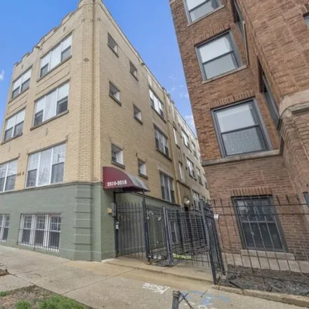 Buy this 2 bed condo on 2016-2018 North Spaulding Avenue in Chicago, IL 60647