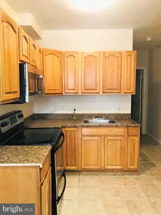 Rent this 6 bed townhouse on 1621 W Montgomery Ave in Philadelphia, Pennsylvania