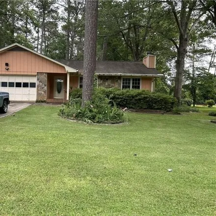 Buy this 3 bed house on 1438 Smithson Dr in Lithonia, Georgia