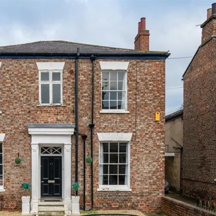 Buy this 5 bed townhouse on Penley's Court in York, YO31 7RW