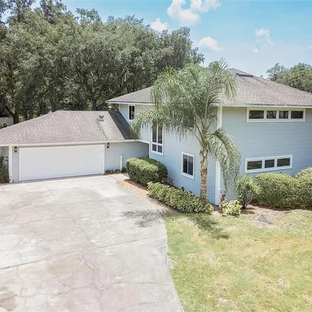 Buy this 5 bed house on 6252 Forestwood Drive East in Polk County, FL 33811