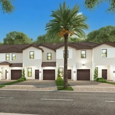 Buy this 4 bed townhouse on Emergency Vehicle Access Road in Pembroke Pines, FL 33082