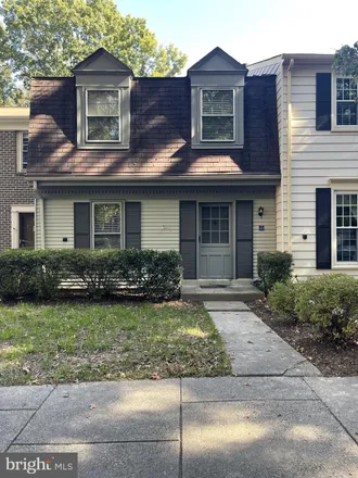 Rent this 3 bed townhouse on Double Eagle Court in Deepwood, Reston