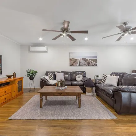 Rent this 4 bed apartment on 19 Constellation Way in Wynnum QLD 4178, Australia