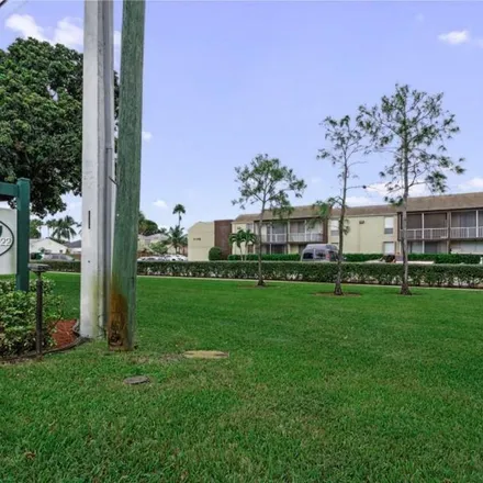 Rent this 3 bed apartment on 7199 Orange Drive in Pine Island, FL 33314