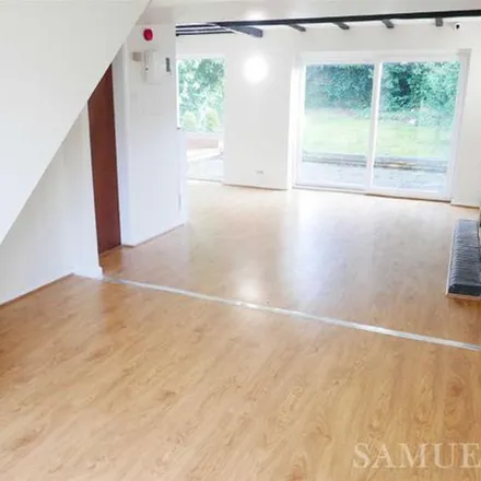 Rent this 4 bed apartment on Ravensdale Gardens in Walsall, WS5 3PX