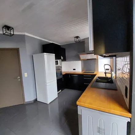 Rent this 3 bed apartment on Avenue Émile Herman 93 in 7170 Manage, Belgium