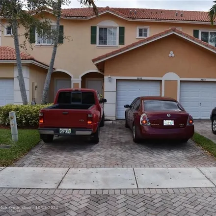 Rent this 3 bed townhouse on 8842 South Isles Circle in Tamarac, FL 33321