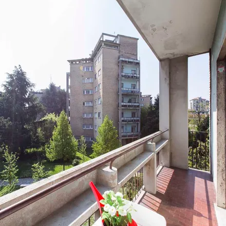 Rent this 4 bed room on Via Pasquale Fornari in 20146 Milan MI, Italy