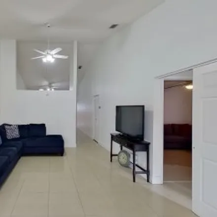 Buy this 3 bed apartment on 8779 Northwest 108Th Street in La Pradera Gardens, Hialeah Gardens