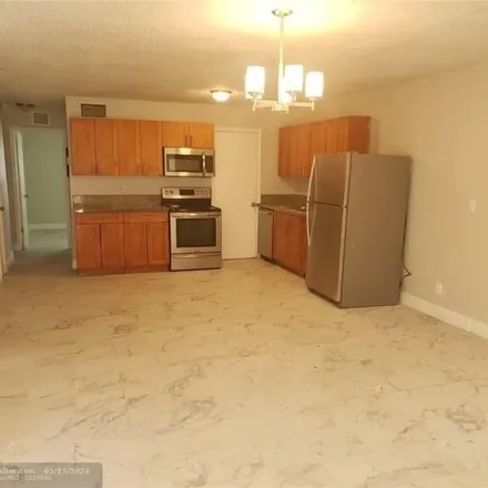 Buy this 9 bed house on 5641 Northwest 27th Court in Lauderhill, FL 33313