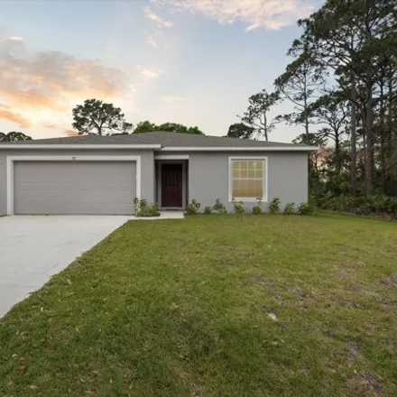 Buy this 3 bed house on 118 Wellsley Ave Sw in Palm Bay, Florida