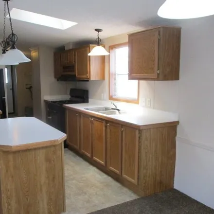 Buy this studio apartment on 23466 Stone Castle Drive in Clinton Charter Township, MI 48036